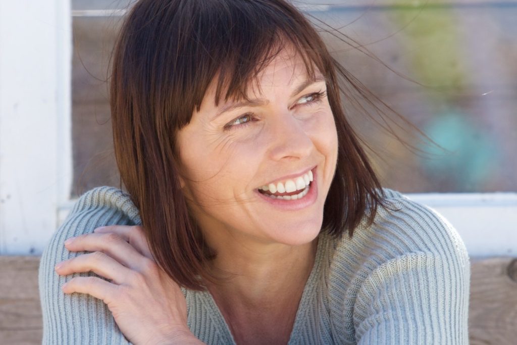 Woman enjoying fall weather